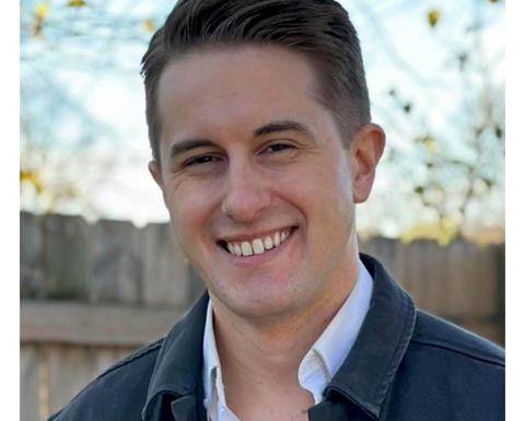 Devin Kennedy smiling in portrait